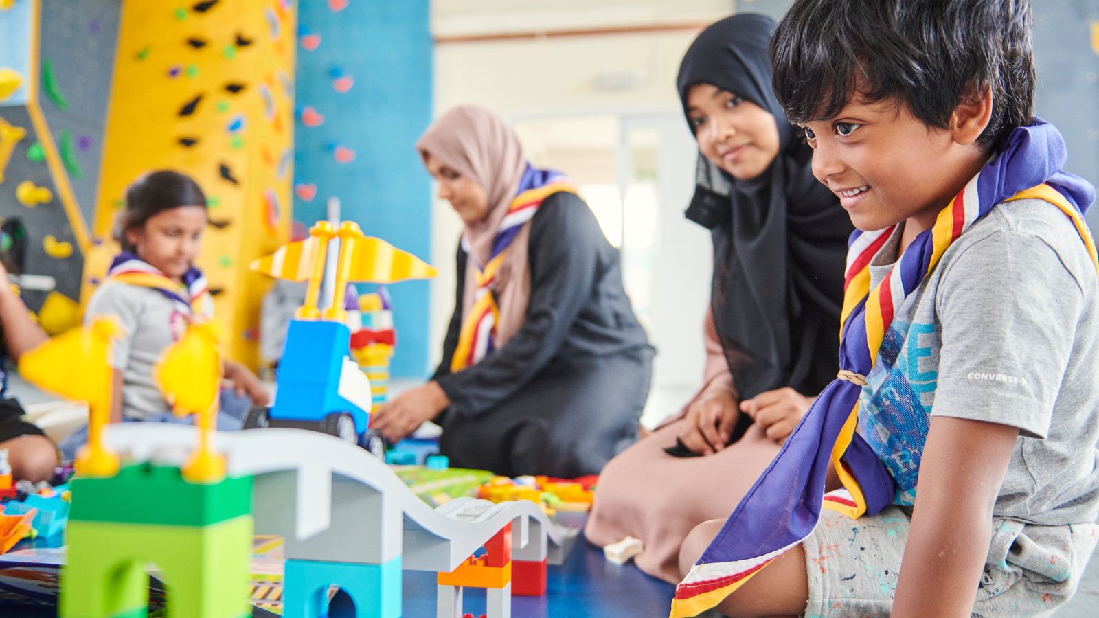 Early years children and adult volunteers jpg